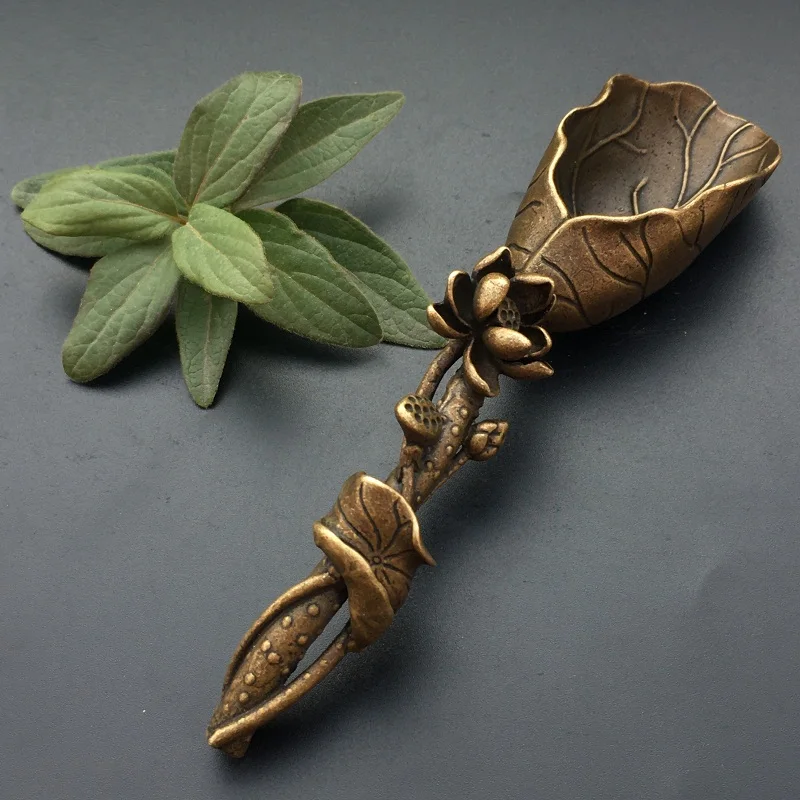 Pure copper creative Tea shovel handmade micro carving antique lotus leaf spoon antique craft bronze ware
Pure copper creative Tea shovel handmade micro carving antique lotus leaf spoon antique craft bronze ware