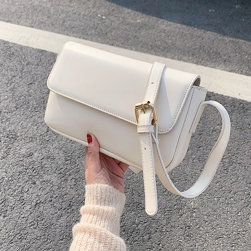Simple PU Leather Crossbody Bags For Women 2020 Solid Color Shoulder Simple Handbags Female Cross Body Travel Bag
Simple PU Leather Crossbody Bags For Women 2020 Solid Color Shoulder Simple Handbags Female Cross Body Travel Bag
