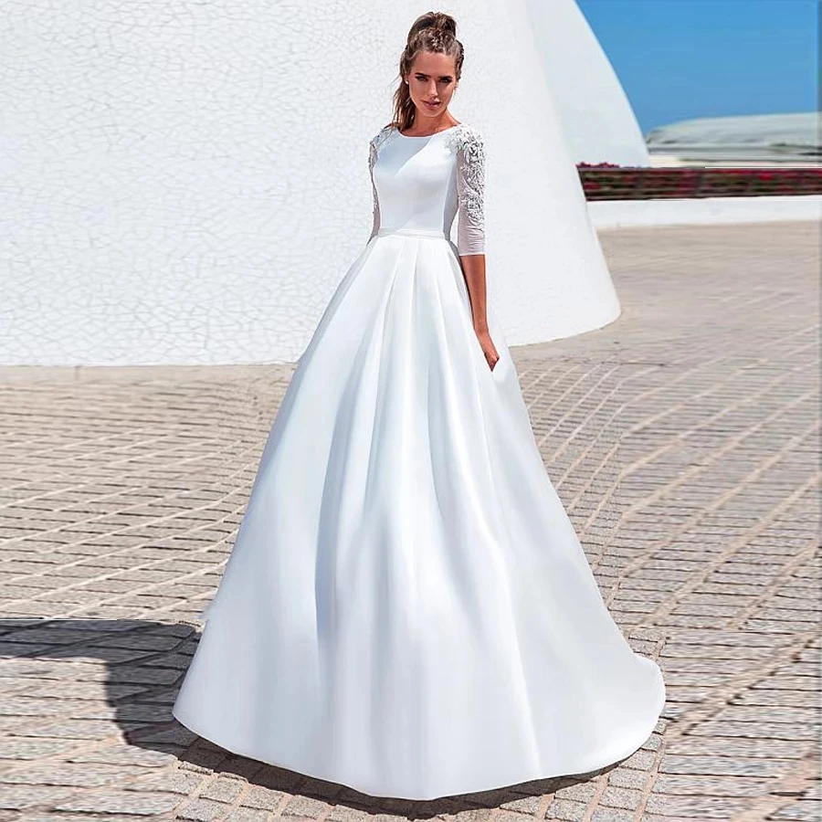 O-neck 3/4 Sleeves Beading Applique Satin A-line Wedding Dress with Pleat Belt Sweep Train Lace-up High Quality Bridal Dress 
O-neck 3/4 Sleeves Beading Applique Satin A-line Wedding Dress with Pleat Belt Sweep Train Lace-up High Quality Bridal Dress