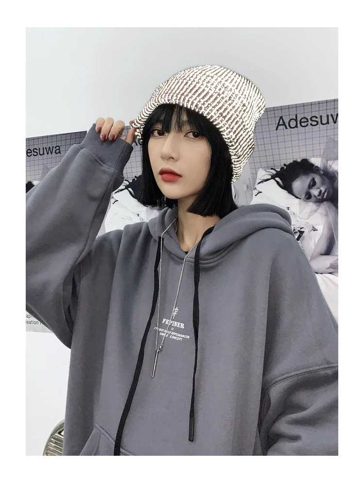 Reflective beanie flat lay showing all four colours