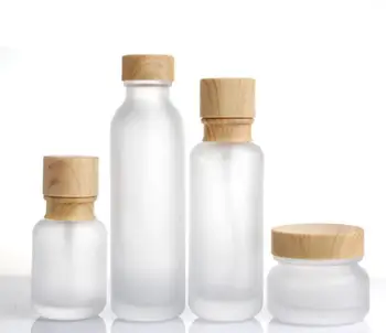 Frosted Glass Jar Lotion Cream Bottles Round Cosmetic Jars Hand Face Lotion Pump Bottle with wood grain cap SN301
Frosted Glass Jar Lotion Cream Bottles Round Cosmetic Jars Hand Face Lotion Pump Bottle with wood grain cap SN301