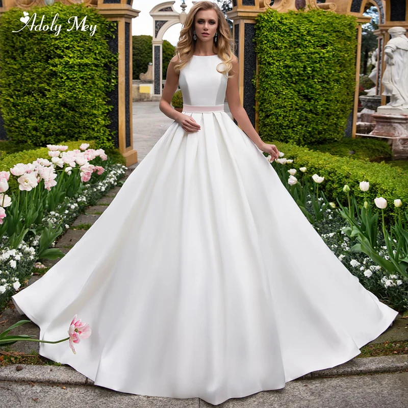 Adoly Mey New Arrival Romantic Scoop Neck Backless A-Line Wedding Dresses 2020 Elegant Sashes Bow Satin Court Train Bridal Dress
Adoly Mey New Arrival Romantic Scoop Neck Backless A-Line Wedding Dresses 2020 Elegant Sashes Bow Satin Court Train Bridal Dress