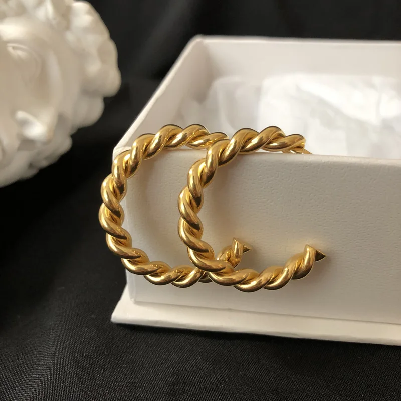2020 Basic Chic French Elegant Ladies Twisted Gold Plated CC Hoop Earrings Geometric Street Style Women's Gold Hoop Earrings
2020 Basic Chic French Elegant Ladies Twisted Gold Plated CC Hoop Earrings Geometric Street Style Women's Gold Hoop Earrings