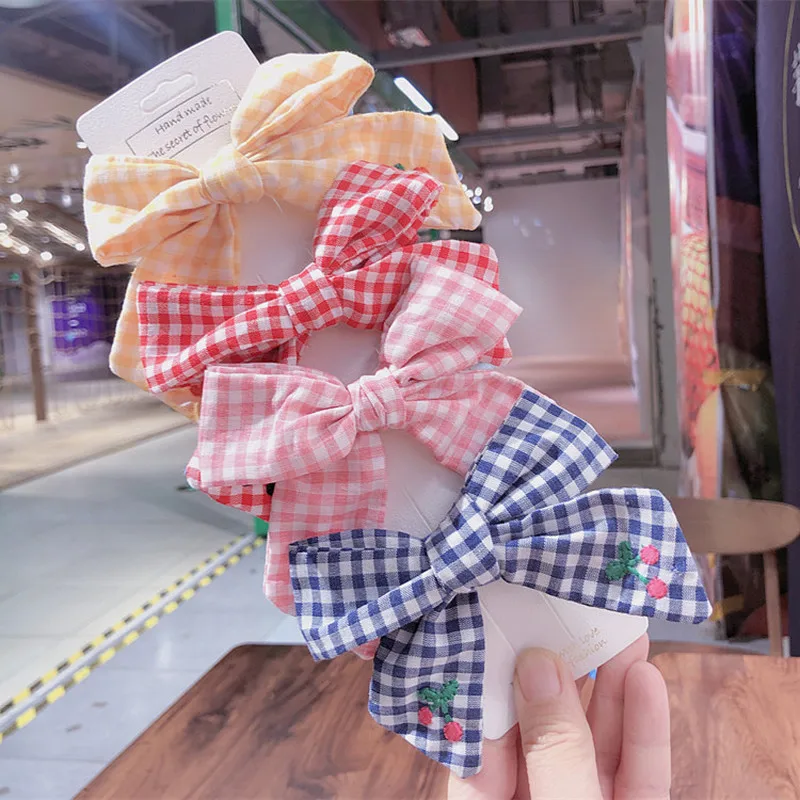2020 Spring New Korea Simple Personality Embroidery Cherry Plaid Fabric Bow Duckbill Clip Fashion Girl Princess Hair Accessories
2020 Spring New Korea Simple Personality Embroidery Cherry Plaid Fabric Bow Duckbill Clip Fashion Girl Princess Hair Accessories