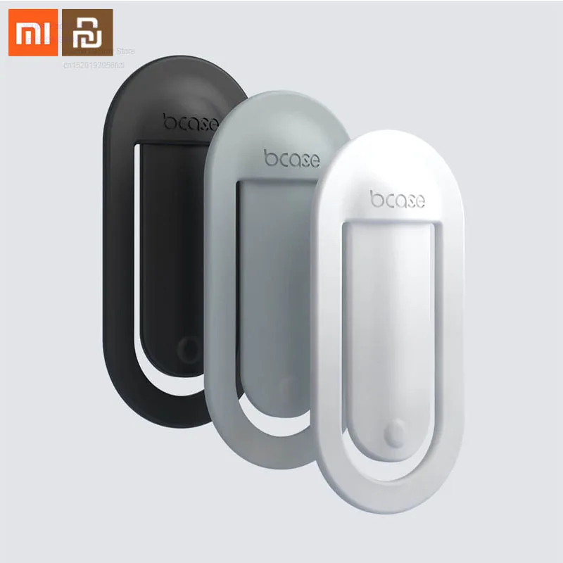 Фото Xiaomi mijia silicone mobile phone bracket car 3mm thick elastic steel sheet one press fixed suitable for watching TV | Электроника