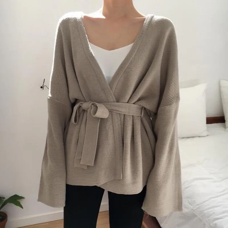 Autumn Winter V Neck Solid Loose Casual Sweater Lace Up Belt Cardigan Sashes Long Sleeve Plus Size Sweater
Autumn Winter V Neck Solid Loose Casual Sweater Lace Up Belt Cardigan Sashes Long Sleeve Plus Size Sweater