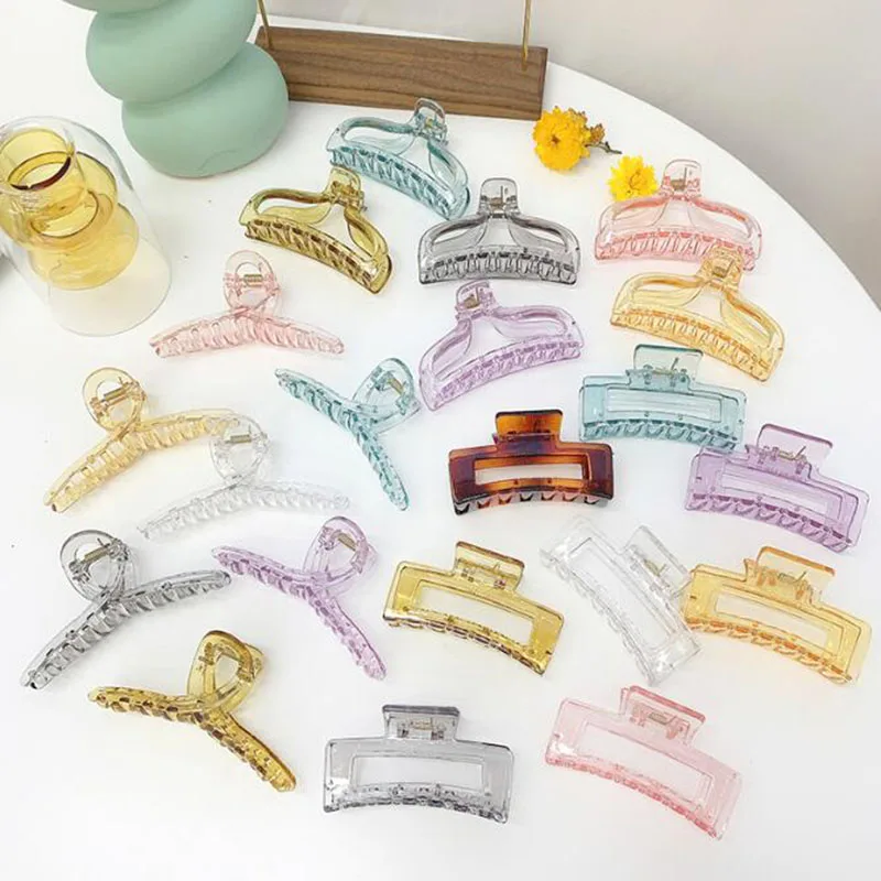 New Rectangle Hair Claws Transparent Plastic Hair Grab Clips Women Korean Hair Accessories for Girls Buckle Bath Ponytail Holder 
New Rectangle Hair Claws Transparent Plastic Hair Grab Clips Women Korean Hair Accessories for Girls Buckle Bath Ponytail Holder