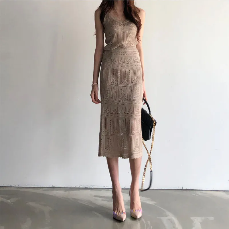 CBAFU new summer knitting 2 piece set women knitted tops spaghetti strap high waist long skirt suit slim hollow out elastic P287
CBAFU new summer knitting 2 piece set women knitted tops spaghetti strap high waist long skirt suit slim hollow out elastic P287