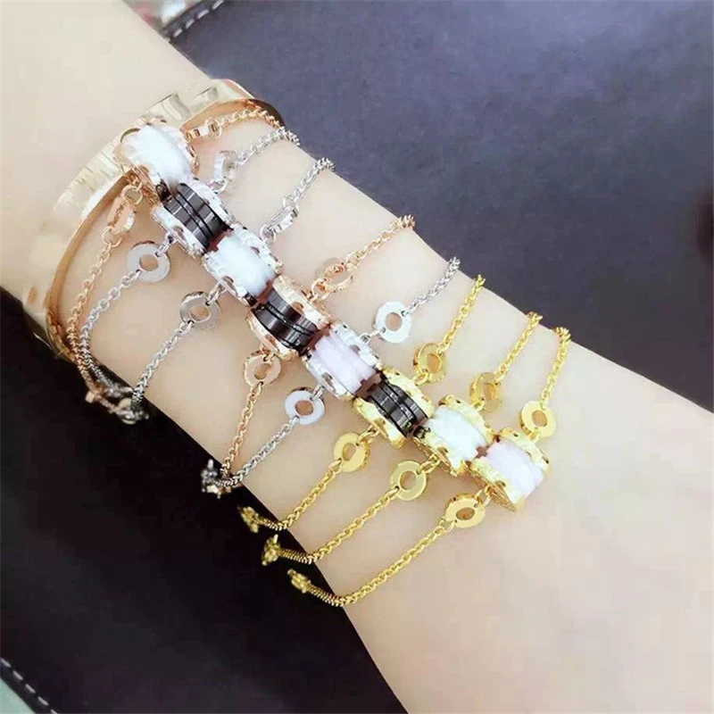 White/Black/Pink Ceramic Stone 316l Titanium Stainless Steel Bracelet Women Luxury Rose/Gold/Platinum Charm Wristlet Hand Chains 
White/Black/Pink Ceramic Stone 316l Titanium Stainless Steel Bracelet Women Luxury Rose/Gold/Platinum Charm Wristlet Hand Chains