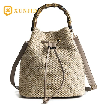 XUNJIDA NEW Women's Summer Beach Straw Handbag Casual Satchel Drawstring Bag Bohemian Round Woody Handle Tote Shoulder Handbag 
XUNJIDA NEW Women's Summer Beach Straw Handbag Casual Satchel Drawstring Bag Bohemian Round Woody Handle Tote Shoulder Handbag