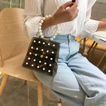 Transparent Jelly Small Bag Female Pearl Hand Bag Pvc Single Shoulder Diagonal Chain Small Square Bag Crossbody Bags For Women 
Transparent Jelly Small Bag Female Pearl Hand Bag Pvc Single Shoulder Diagonal Chain Small Square Bag Crossbody Bags For Women
