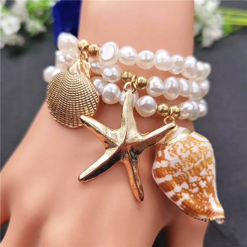 Gold Color Starfish Conch Cowrie Shell Bracelets for Women Imitation Pearl Bead Charm Bracelet 2019 New Fashion Beach Jewelry
Gold Color Starfish Conch Cowrie Shell Bracelets for Women Imitation Pearl Bead Charm Bracelet 2019 New Fashion Beach Jewelry