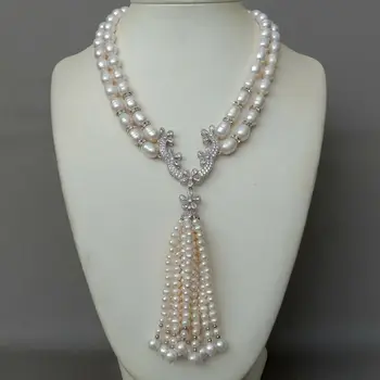 19" 2 Strands Cultured White Rice Pearl Necklace CZ Pave Pearl Tassel Pendant 
19" 2 Strands Cultured White Rice Pearl Necklace CZ Pave Pearl Tassel Pendant