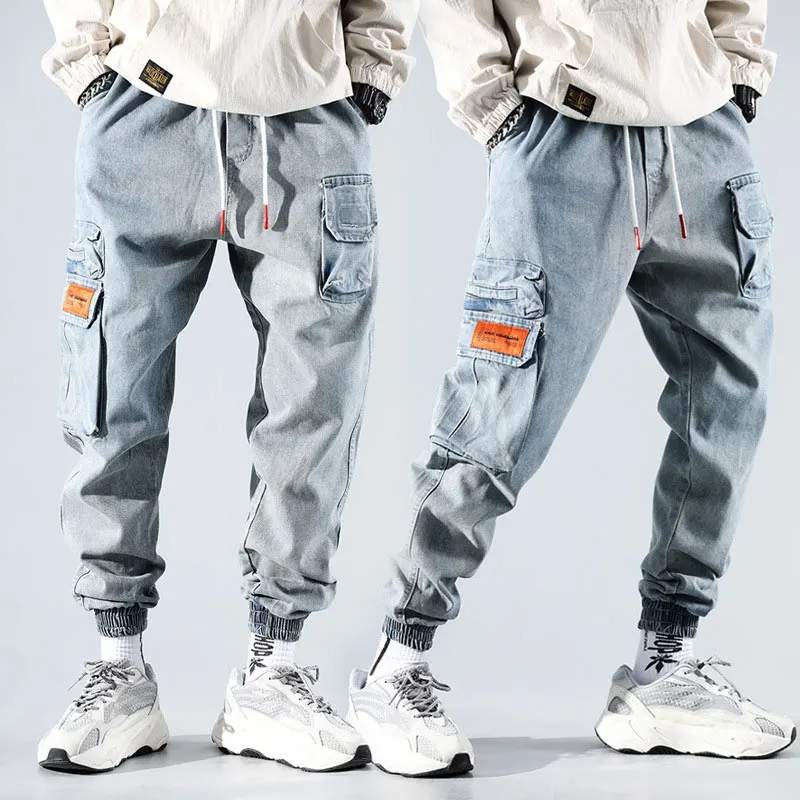 Fashion Streetwear Men Jeans Spliced Pocket Cargo Pants Light Blue Loose Fit Embroidery Designer Harem Jeans Hip Hop Jeans Men
Fashion Streetwear Men Jeans Spliced Pocket Cargo Pants Light Blue Loose Fit Embroidery Designer Harem Jeans Hip Hop Jeans Men