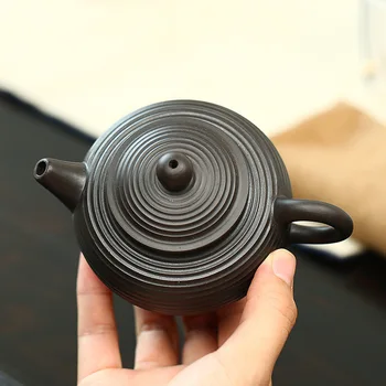 Yixing Yixing Tea Set Raw Ore Black Mud Thread Bead Pot Rib Dark-red Enameled Pottery Teapot Manual Goods
Yixing Yixing Tea Set Raw Ore Black Mud Thread Bead Pot Rib Dark-red Enameled Pottery Teapot Manual Goods