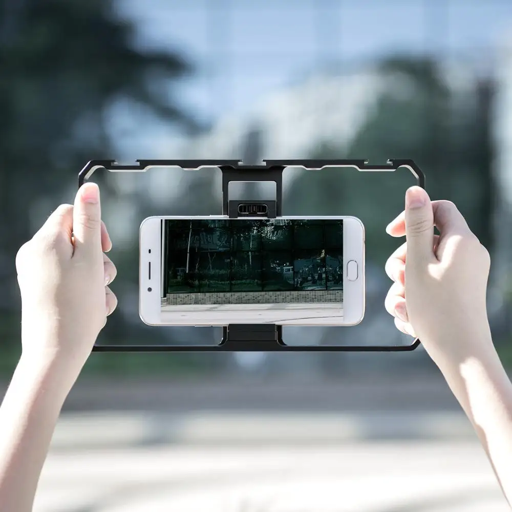 YELANGU PC06 Phone Video Cage Handheld Stabilizer Film For SmartPhone Hand Grip Bracket Mobile Phone Stabilizer
YELANGU PC06 Phone Video Cage Handheld Stabilizer Film For SmartPhone Hand Grip Bracket Mobile Phone Stabilizer