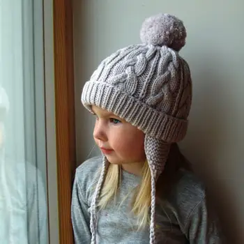 2020 New Winter Children Pompom Knitted Beanie Crochet Hat Thick Warm Braid Earflap Cap Children Winter Warm Soft Cap 
2020 New Winter Children Pompom Knitted Beanie Crochet Hat Thick Warm Braid Earflap Cap Children Winter Warm Soft Cap