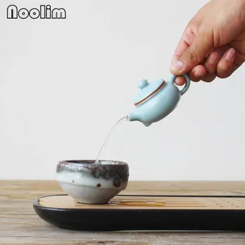 1pc Mini Kiln Porcelain Teapot Creative Ceramic Fingertip Tea Pot Small Boutique Tea Pet Ornaments Kitchen Kung Fu Kettle
1pc Mini Kiln Porcelain Teapot Creative Ceramic Fingertip Tea Pot Small Boutique Tea Pet Ornaments Kitchen Kung Fu Kettle