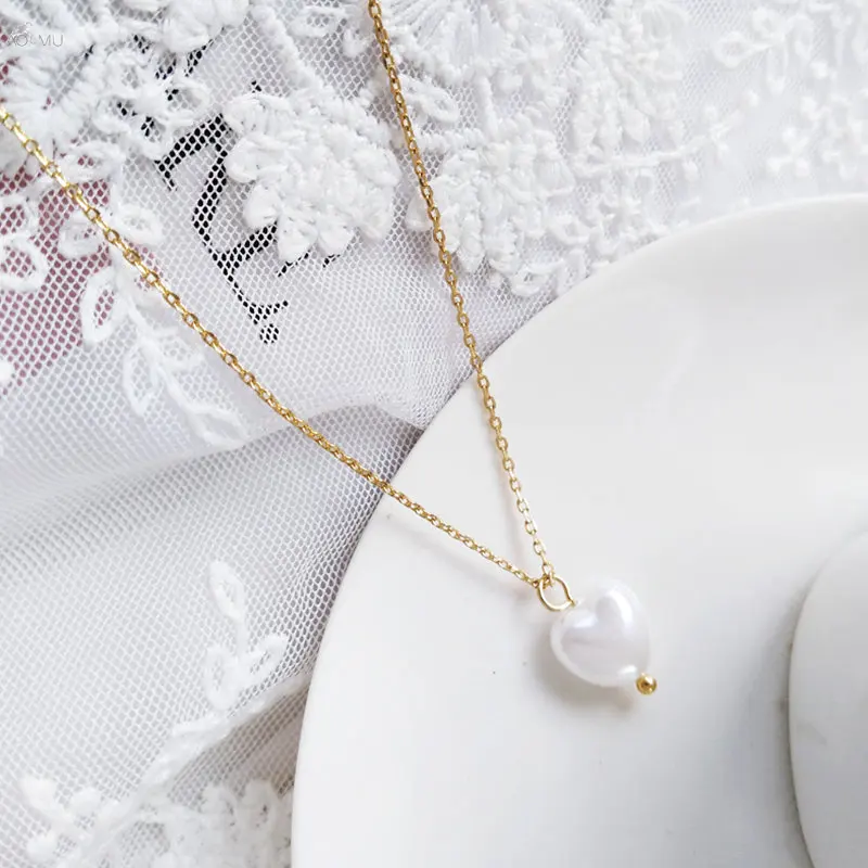 AOMU Simple Imitation Pearl Heart Pendant Necklace For Women Metal Chain Clavicle Necklace Fashion Charm Jewelry
AOMU Simple Imitation Pearl Heart Pendant Necklace For Women Metal Chain Clavicle Necklace Fashion Charm Jewelry
