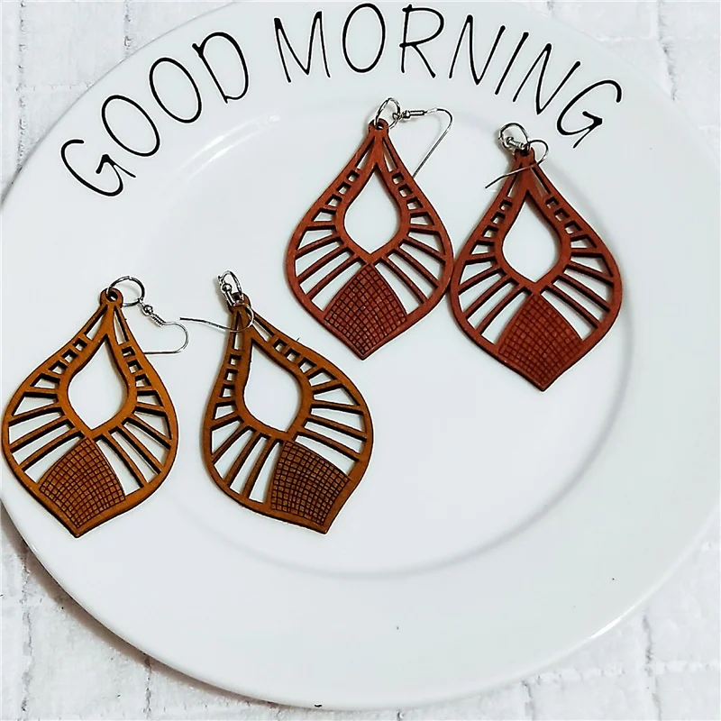 SOHOT Handmade Natural Wooden Carving Hollow Leaf Shape Women Drop Earrings Chic Colorful Vintage Trendy Jewelry Brincos
SOHOT Handmade Natural Wooden Carving Hollow Leaf Shape Women Drop Earrings Chic Colorful Vintage Trendy Jewelry Brincos