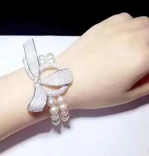 Handmade micro inlay zircon clasp natural 2row 7-8mm white freshwater pearl bracelet 925silver
Handmade micro inlay zircon clasp natural 2row 7-8mm white freshwater pearl bracelet 925silver