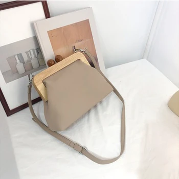 Korean Retro Soft Leather Wooden Clip Women Bags Casual Crossbody Bags Retro Shoulder Messenger Bag Lady Handbags Clutch 2020
Korean Retro Soft Leather Wooden Clip Women Bags Casual Crossbody Bags Retro Shoulder Messenger Bag Lady Handbags Clutch 2020