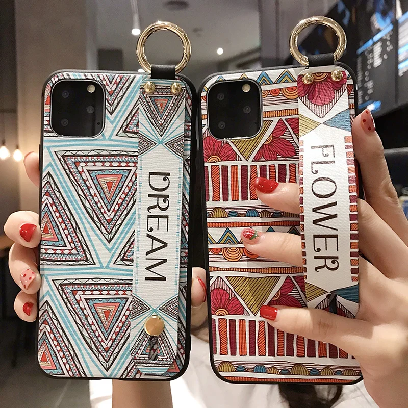Luxury Wrist Strap Retro Relief Pattern Cover Case For iPhone 11 Pro Max Soft Silicone Stand Phone Case For iPhone 6 6S 7 8 Plus
Luxury Wrist Strap Retro Relief Pattern Cover Case For iPhone 11 Pro Max Soft Silicone Stand Phone Case For iPhone 6 6S 7 8 Plus