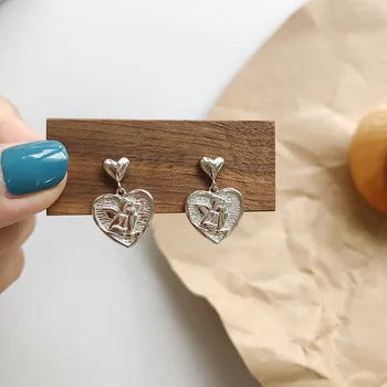 Silvology 925 Sterling Silver Heart Angel Stud Earrings Relief Creative Temperament Cute Earrings for Women 925 Festival Jewelry 
Silvology 925 Sterling Silver Heart Angel Stud Earrings Relief Creative Temperament Cute Earrings for Women 925 Festival Jewelry