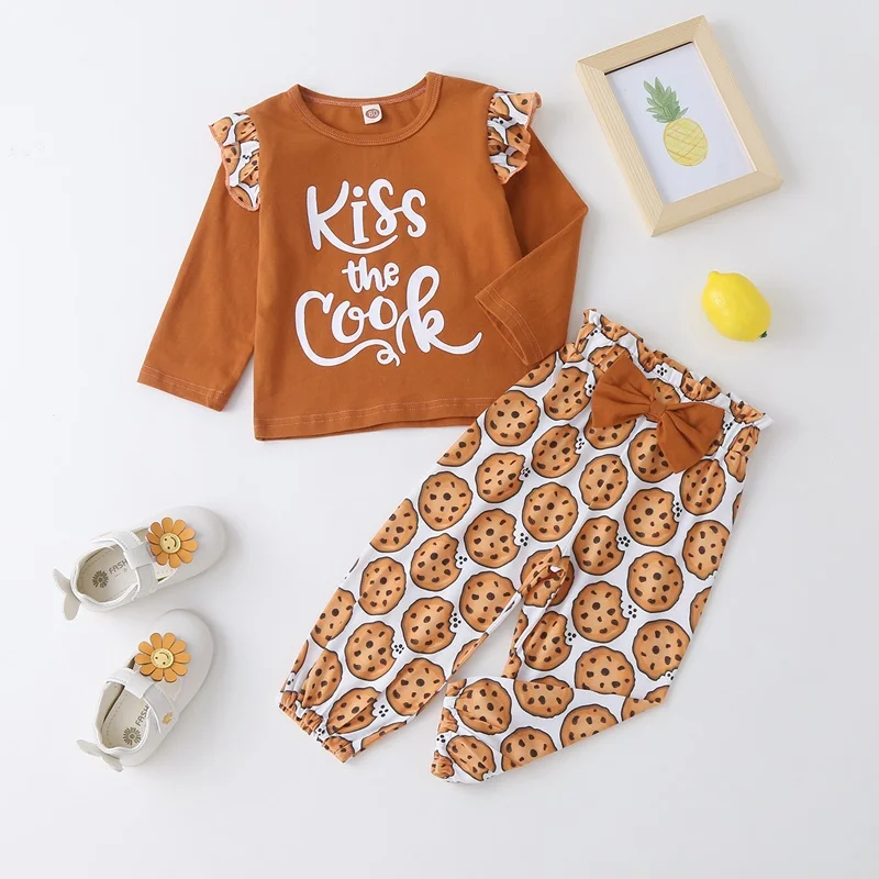 Winter Kids Outfits Fashion Clothes Baby Girl Clothes Set 2pcs Letter Long Flying Sleeve Tops+bow Cookies Print Trousers 0-18M
Winter Kids Outfits Fashion Clothes Baby Girl Clothes Set 2pcs Letter Long Flying Sleeve Tops+bow Cookies Print Trousers 0-18M