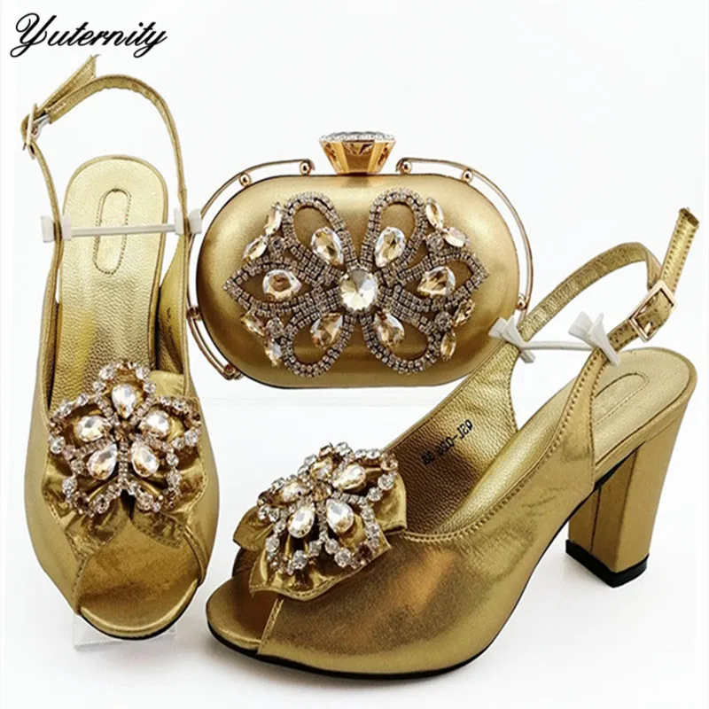 Italian Style Gold Sandals Ladies's Dress Shoes And Bag Set Decoration With Crystal Pumps Shoes And Bag Set For Wedding Party
Italian Style Gold Sandals Ladies's Dress Shoes And Bag Set Decoration With Crystal Pumps Shoes And Bag Set For Wedding Party