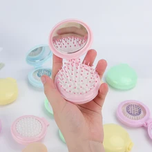Folding Hair Comb Mini With Mirror Compact Pocket Size Portable Travel Hair Brush Women Cosmetic Mirror Head Scalp Massager 2022
Folding Hair Comb Mini With Mirror Compact Pocket Size Portable Travel Hair Brush Women Cosmetic Mirror Head Scalp Massager 2022