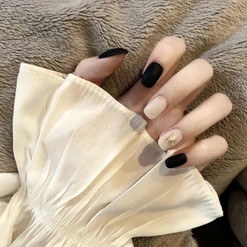 24pcs/box Simple Fashion Black Beige Rivet Fake Nails press on Short Suitable Decor Finished Patches artificial nails with glue 
24pcs/box Simple Fashion Black Beige Rivet Fake Nails press on Short Suitable Decor Finished Patches artificial nails with glue