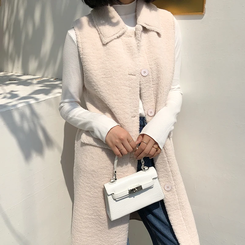 Women Long Sleeveless Hoodies Faux Fur Coat Vest Winter Jacket Casaco Feminin Female Autumn Fleece Plush Veste Femme
Women Long Sleeveless Hoodies Faux Fur Coat Vest Winter Jacket Casaco Feminin Female Autumn Fleece Plush Veste Femme