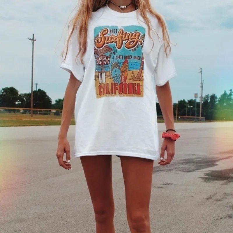 Summer Casual Oversized Tee The Best Surfing Santa Monica California Womens Retro Style T-Shirt Vacation Beach Shirt
Summer Casual Oversized Tee The Best Surfing Santa Monica California Womens Retro Style T-Shirt Vacation Beach Shirt