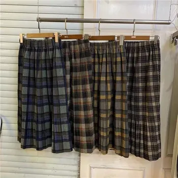 High Waist Vintage pleated skirts Fashion winter women woolen Plaid skirt Casual streetwear Drawstring elastic waist midi skirt
High Waist Vintage pleated skirts Fashion winter women woolen Plaid skirt Casual streetwear Drawstring elastic waist midi skirt
