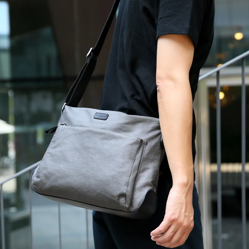 Muzee New Style Korean-style Canvas Bag Shoulder Bag Large Capacity Men Solid Color Shoulder Bag Sports Leisure Bag
Muzee New Style Korean-style Canvas Bag Shoulder Bag Large Capacity Men Solid Color Shoulder Bag Sports Leisure Bag
