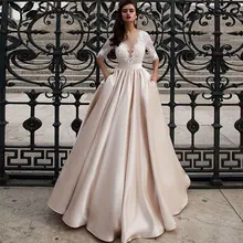 Sexy Deep V-Neck Princess Wedding Dresse Lace Appliques Half Sleeves Ball Gown Stain Bow Backless Bride Robe Mariée Custom Made
Sexy Deep V-Neck Princess Wedding Dresse Lace Appliques Half Sleeves Ball Gown Stain Bow Backless Bride Robe Mariée Custom Made