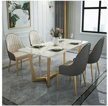 Nordic marble dining table household light luxury dining table chair combination modern simple rectangular dining table 
Nordic marble dining table household light luxury dining table chair combination modern simple rectangular dining table