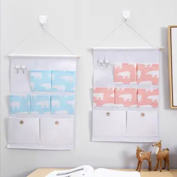 7 pockets Cotton Linen Wall Hanging Bag Shoe Rack Hanger Wall Mounted Wardrobe Organizer Cosmetic Closet Toys Storage S25 
7 pockets Cotton Linen Wall Hanging Bag Shoe Rack Hanger Wall Mounted Wardrobe Organizer Cosmetic Closet Toys Storage S25