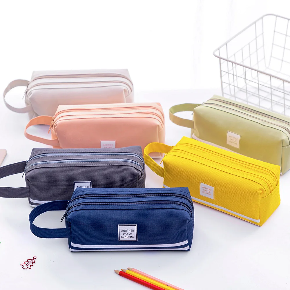 Simple large-capacity pencil case with handle, creative multi-functional double-layer pencil case, student supplies pencil case
Simple large-capacity pencil case with handle, creative multi-functional double-layer pencil case, student supplies pencil case