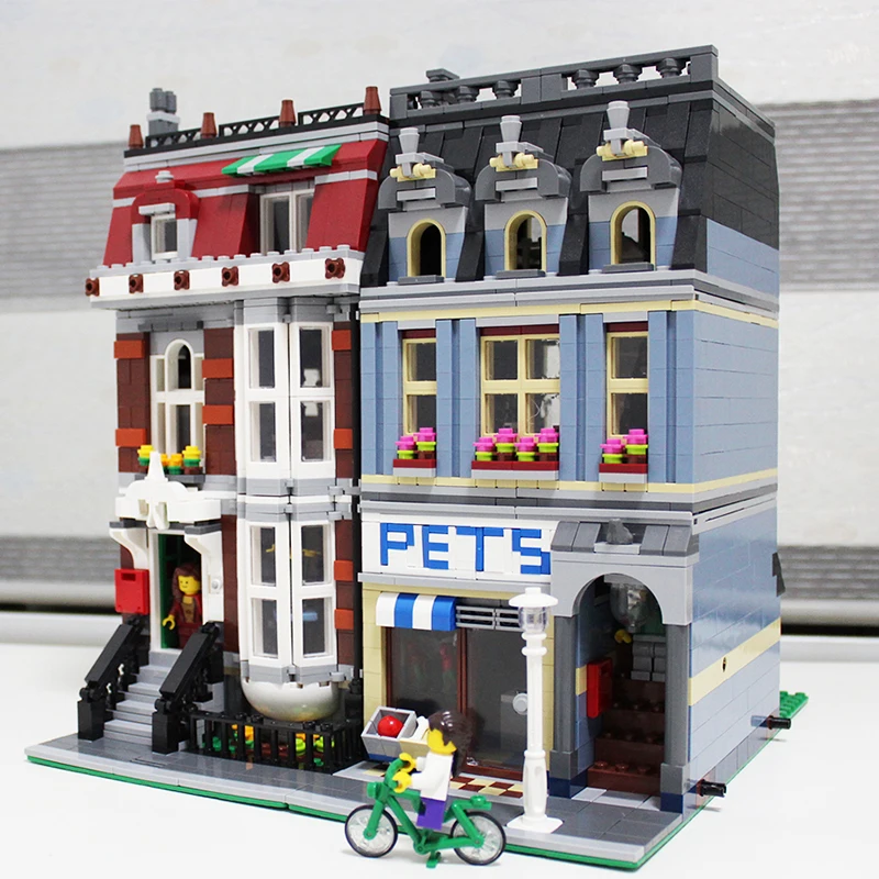 DHL 15009 City Street set Pet Shop Model Building Kits Blocks action bricks baby lovely toy 10218 DIY Educational Gift
DHL 15009 City Street set Pet Shop Model Building Kits Blocks action bricks baby lovely toy 10218 DIY Educational Gift