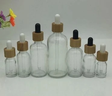 Прозрачная стеклянная бутылка-капельница, 30 мл, косметический продукт для ухода за кожей, бамбуковый колпачок, деревянная крышка, контейнер для упаковки эфирных масел
Прозрачная стеклянная бутылка-капельница, 30 мл, косметический продукт для ухода за кожей, бамбуковый колпачок, деревянная крышка, контейнер для упаковки эфирных масел