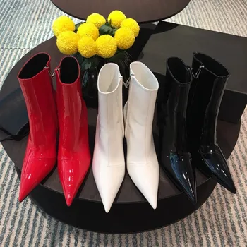 European and American autumn and winter new pointy stiletto boots female patent leather side zipper Martin boots and ankle boots 
European and American autumn and winter new pointy stiletto boots female patent leather side zipper Martin boots and ankle boots