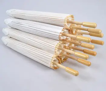 50pcs/lot Chinese Craft Paper Umbrella for Wedding Photograph Accessory Party Decor White Paper Long-handle Parasol 
50pcs/lot Chinese Craft Paper Umbrella for Wedding Photograph Accessory Party Decor White Paper Long-handle Parasol