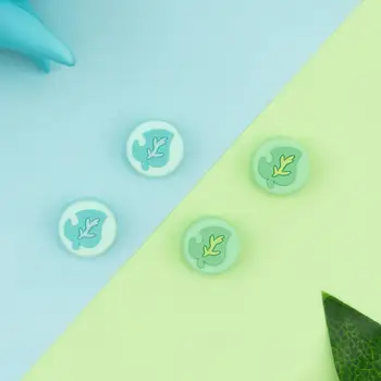 GeekShare 4PCS Silicone Leaves Joy Con Thumb Grip Set Joystick Caps Switch and Switch Lite Cover Analog Thumb Stick Grips
GeekShare 4PCS Silicone Leaves Joy Con Thumb Grip Set Joystick Caps Switch and Switch Lite Cover Analog Thumb Stick Grips