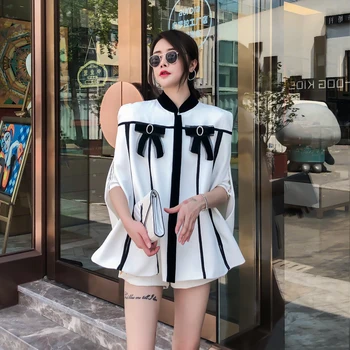 Black White Bowknot Decoration Cape Cloak Famous Women Autumn Stand Collar Casual Loose Party Work Poncho Coat Overcoat
Black White Bowknot Decoration Cape Cloak Famous Women Autumn Stand Collar Casual Loose Party Work Poncho Coat Overcoat