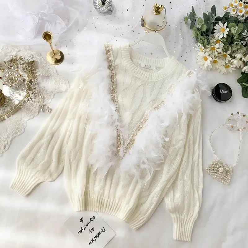 Luxury Women's Feather Lotus Leaf Side Pearl Bead Knitted Shirt Thin Sweater Femme Lady Pull Sweaters Autumn 2019 Jumper
Luxury Women's Feather Lotus Leaf Side Pearl Bead Knitted Shirt Thin Sweater Femme Lady Pull Sweaters Autumn 2019 Jumper