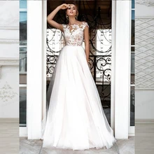 Boho Wedding Dresses For Women Lace Appliques Cap Sleeve Princess Tulle Bridal Gowns With Long Court Train Backless For Summer
Boho Wedding Dresses For Women Lace Appliques Cap Sleeve Princess Tulle Bridal Gowns With Long Court Train Backless For Summer