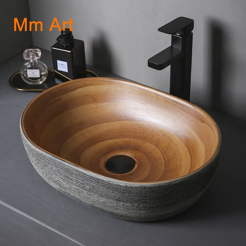 

Art stage basin oval wash basin household wash basin bathroom creative European retro ceramic wash basin