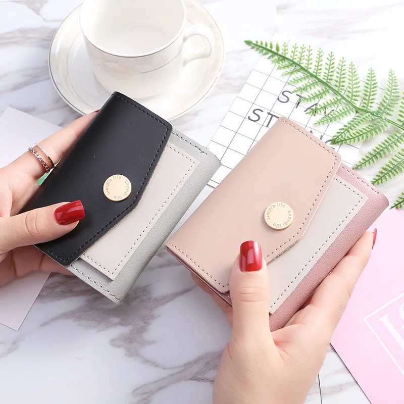 Small wallet female short 2020 new Korean version ins folding multifunctional simple mini coin bag fashion card holder
Small wallet female short 2020 new Korean version ins folding multifunctional simple mini coin bag fashion card holder